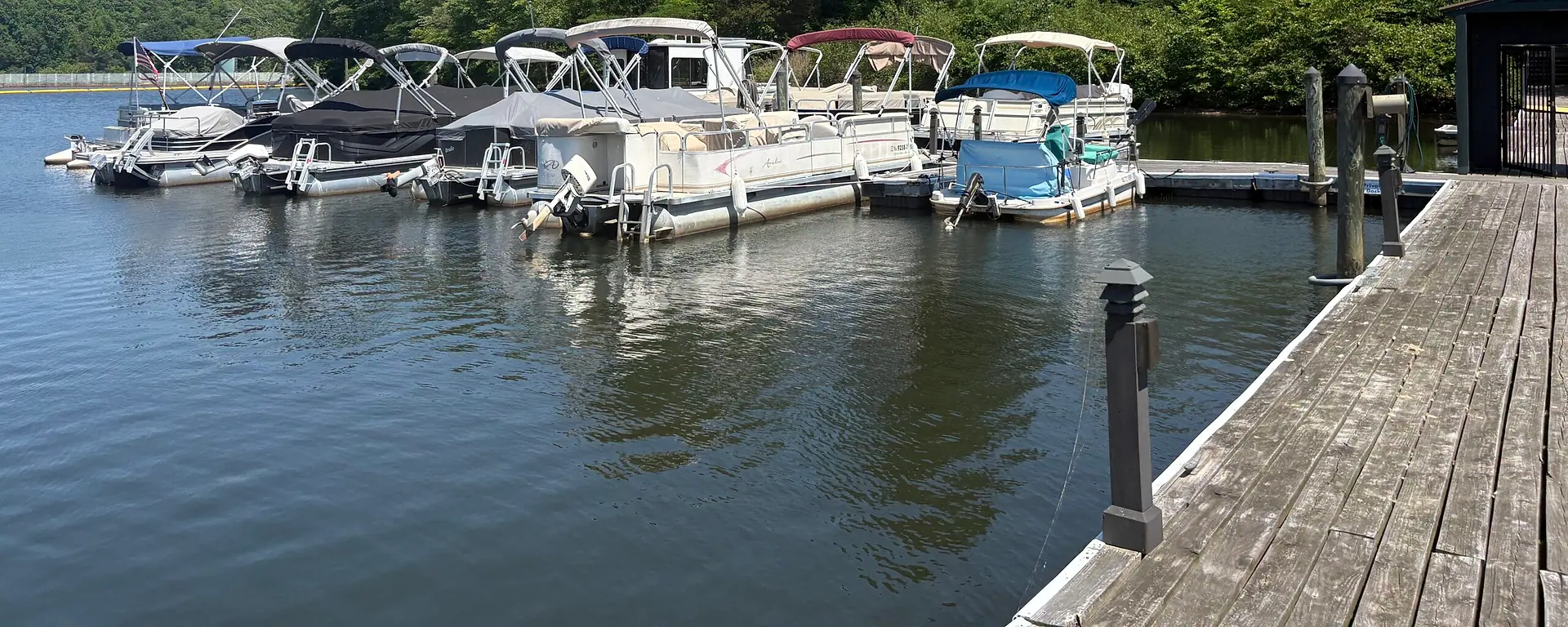 Pontoon boats at the Brandermill marina on Swift Creek Reservoir